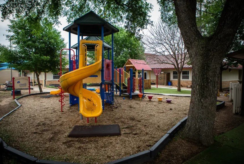 The University of Texas Child Development day care center in Austin on April 6, 2020. Restaurant, retail and movie theater workers may be called back to work as soon as Friday. But licensed child care remains open only for children of "essential" workers.